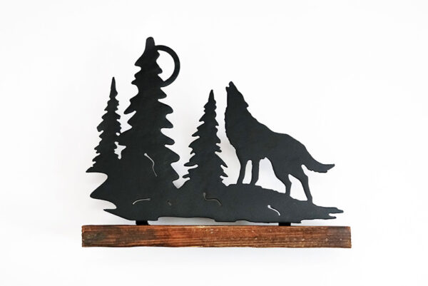Wolf Howling at moon on wood