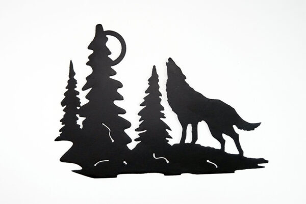 Large wolf howling in the moon